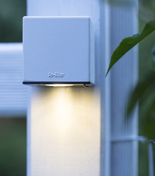 White In-Lite Cubid light on fence post