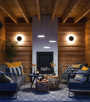 In-Lite Black Disk Wall installed on wall and illuminated.